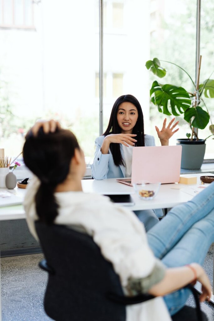 women talking at work